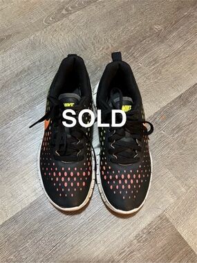 Nike Black Athletic Shoes with Orange and Yellow Accents